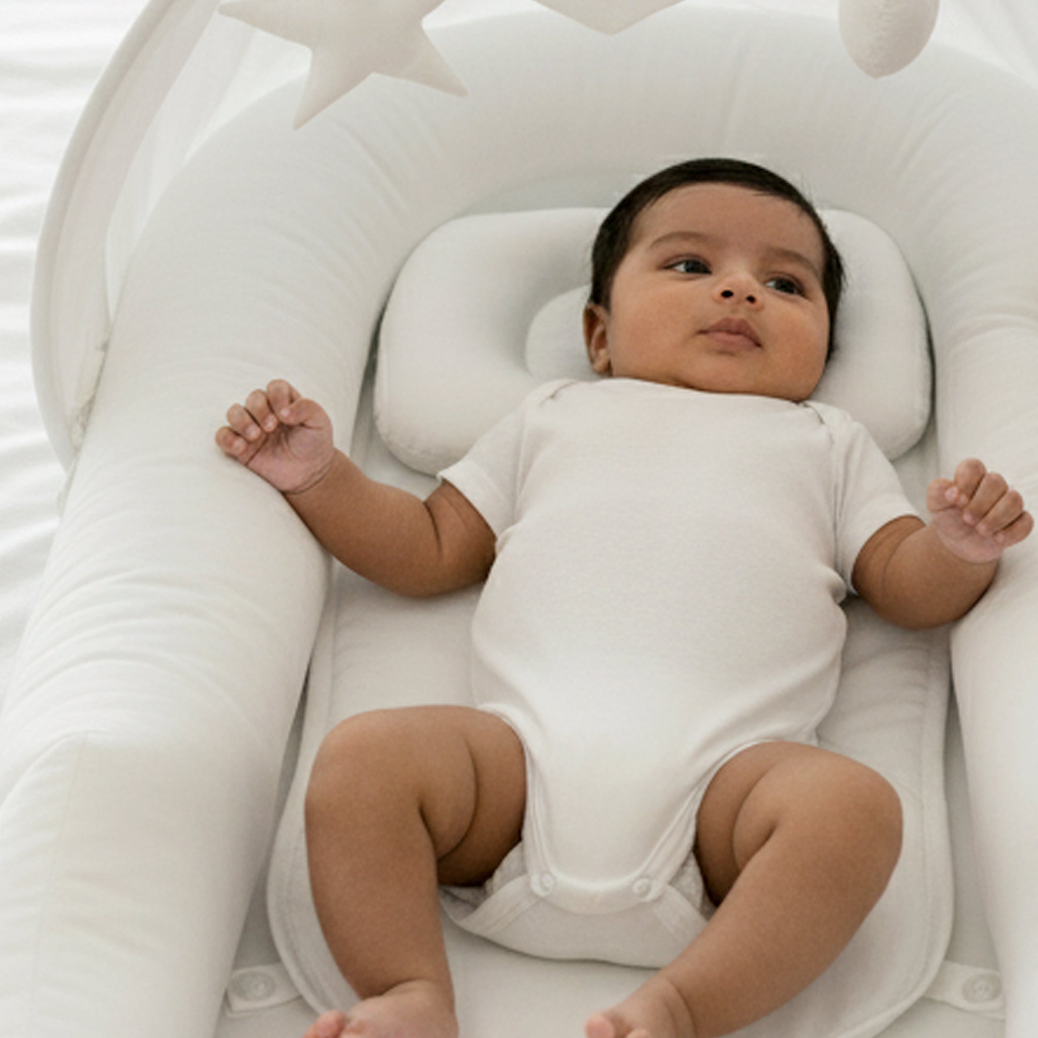 CREAM NESTO PAD DONUT PILLOW