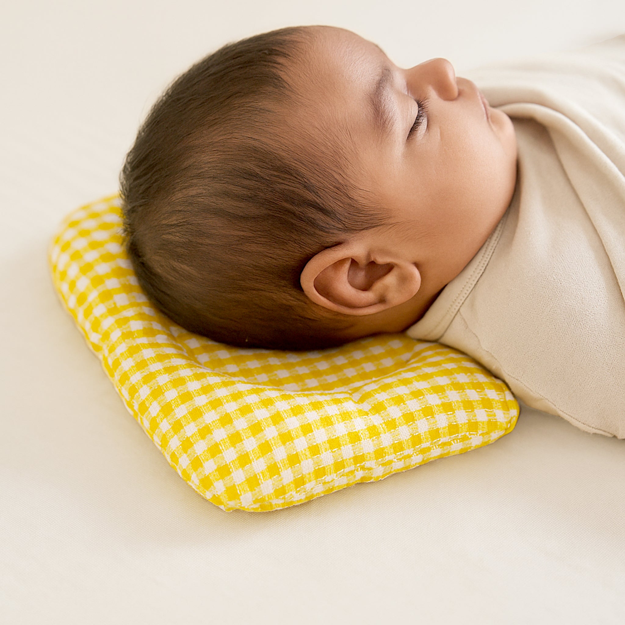 YELLOW GINGHAM NESTO PAD DONUT PILLOW